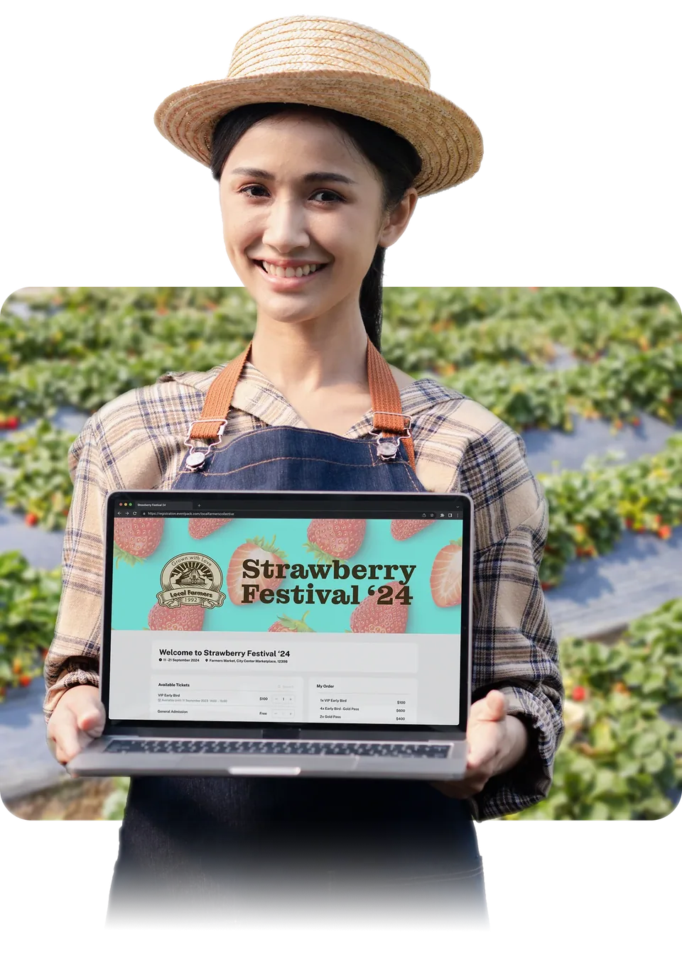 Organizer holding a laptop with a branded registration page
