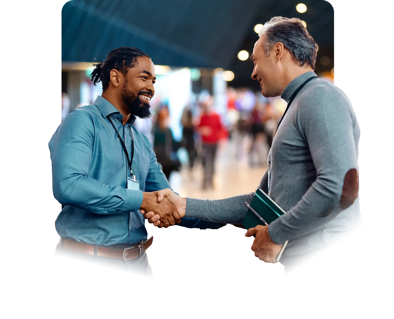 Two people shaking hands at an event
