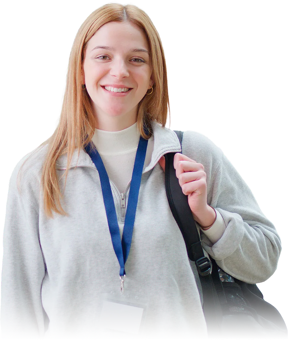 Student holding an event badge printed by Eventpack